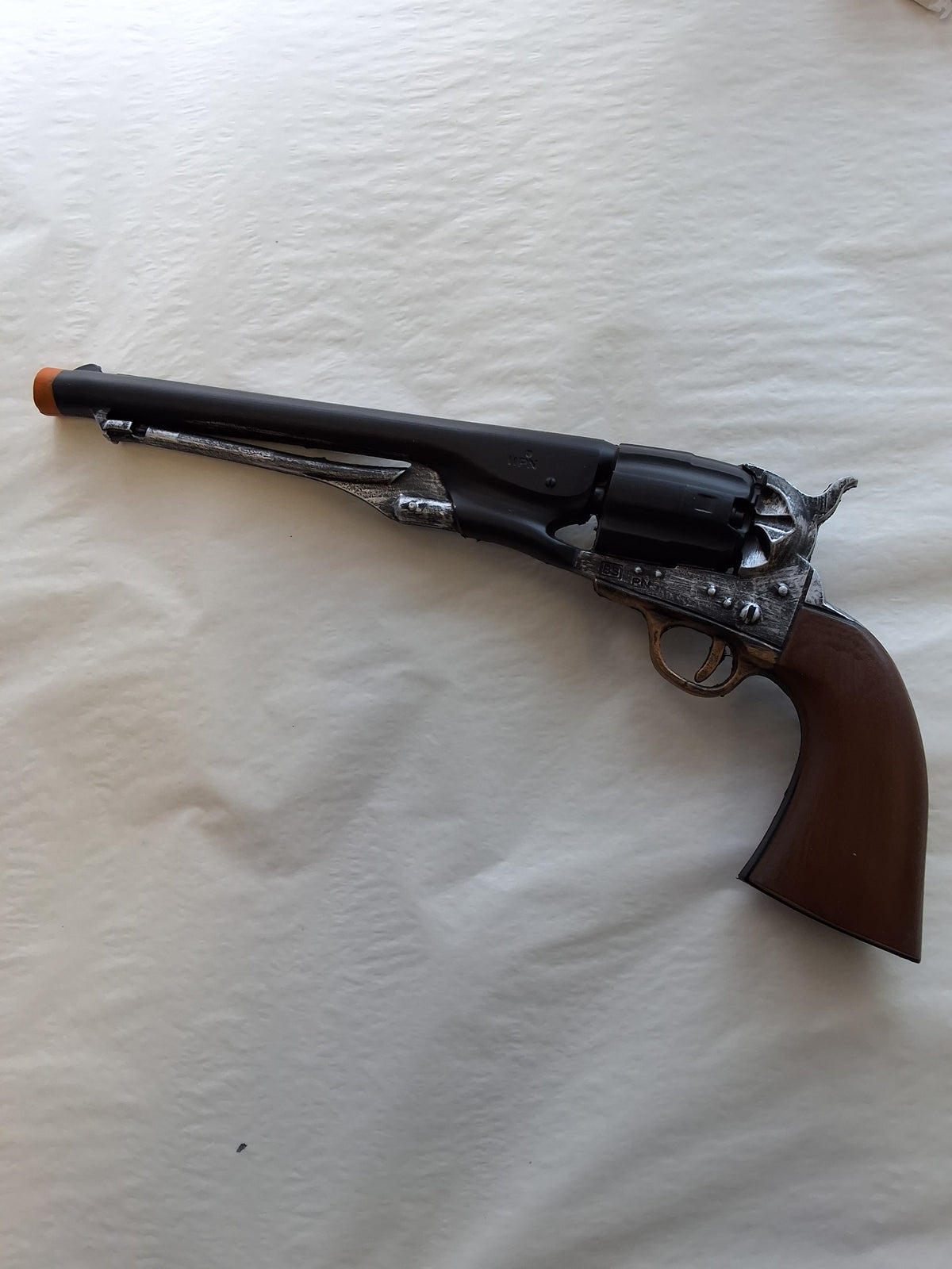 BLACK SILVER AND GOLD REVOLVER