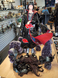 Itachi on drift wood with crows