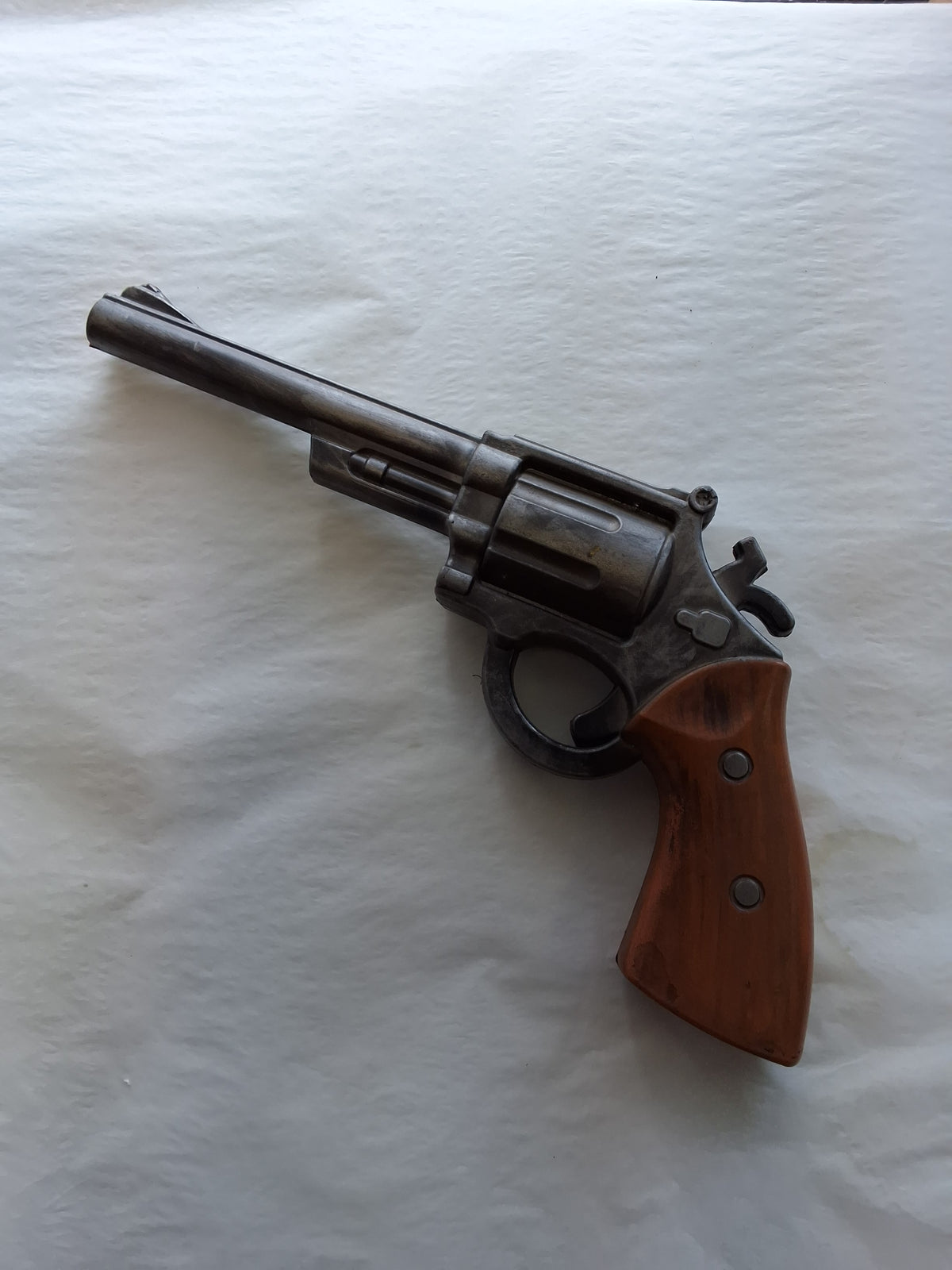 DARK SILVER AND BROWN REVOLVER
