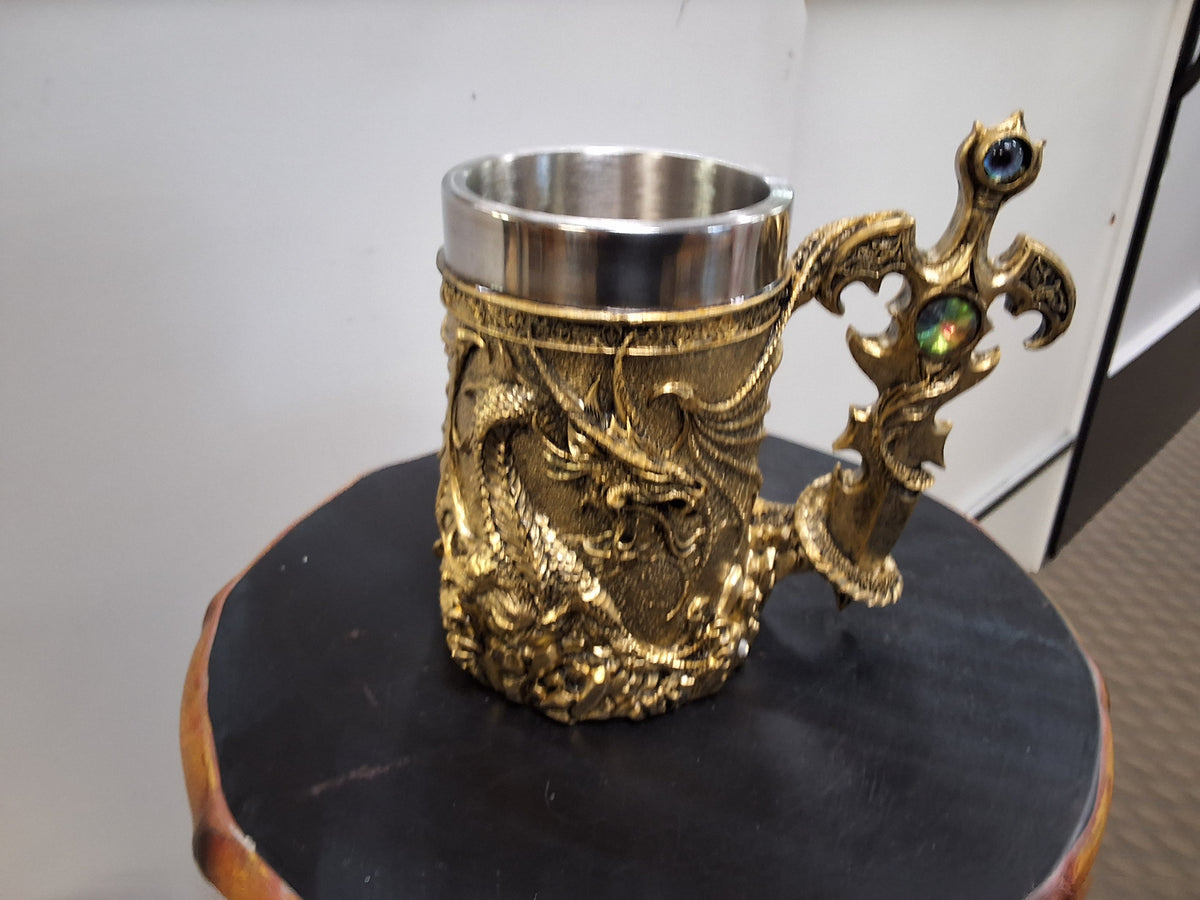Gold Dragon With Old Sword Handle With Jewel And  Eyeball In the Palmer Of The Sword Mug