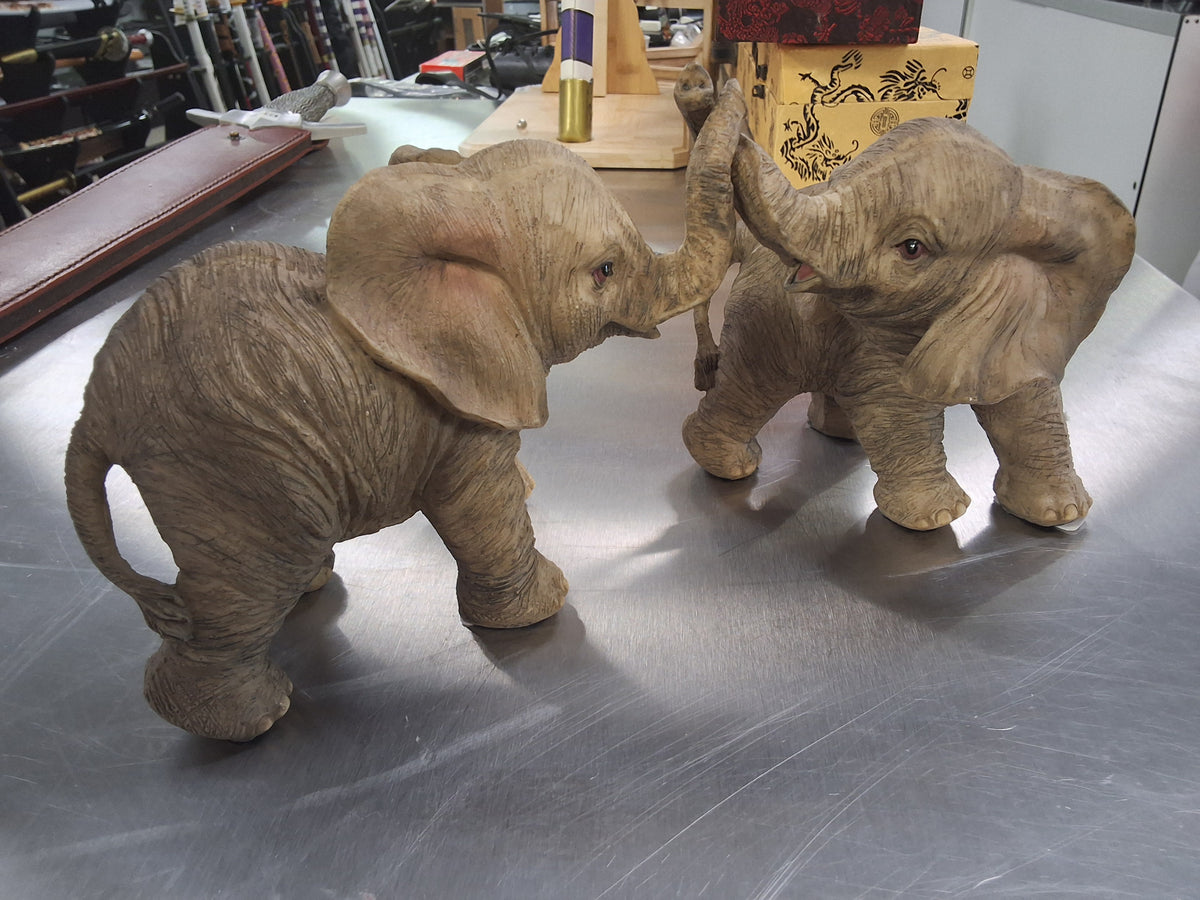 Elephant's High-Fiving Long Day At Work