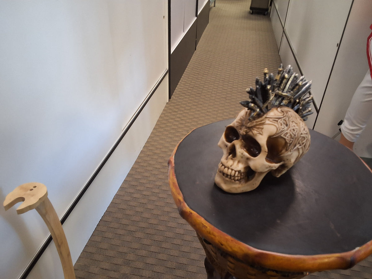 Skull with a Celtic knot work and Blades Coming Out of Skull as a Mohawk