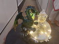 Green Dragon Guarding The Light Bulb