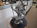 Silver Dragon On Top Of Stone Perch With Sword