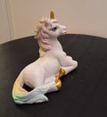 Pastel sitting Unicorn