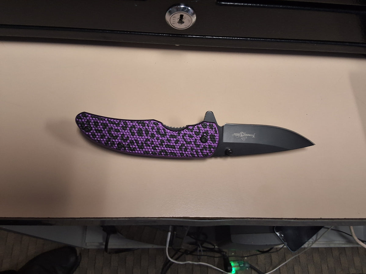 Purple cheetah handle folding knife