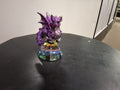 Baby Dragon Sitting On Top Of Crystal Pyramid