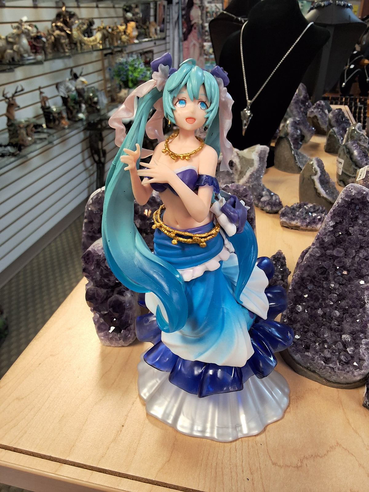 Girl with blue hair standing on sea shell #1569