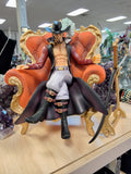 Mihawk Sitting On Orange Chair