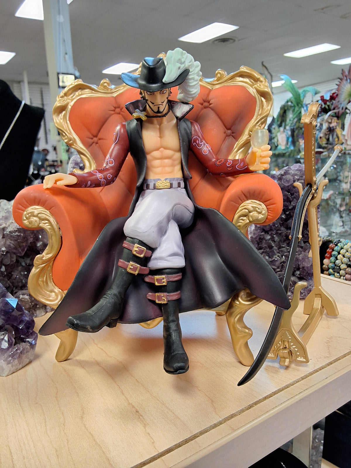 Mihawk Sitting On Orange Chair