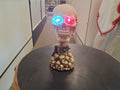 Skull With Spiked Choker On Pile With Light Up Eyes
