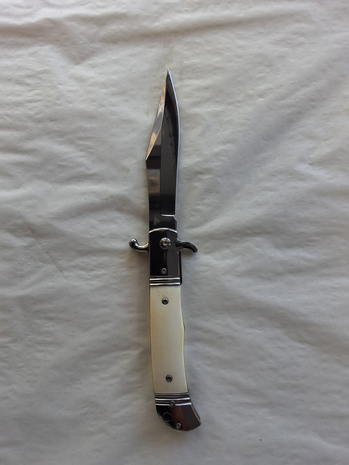 Large genuine damas. switchblade w/ Camel bone handle #2047