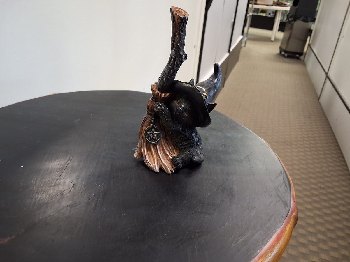 Magic Cat On Broomstick Facing Right