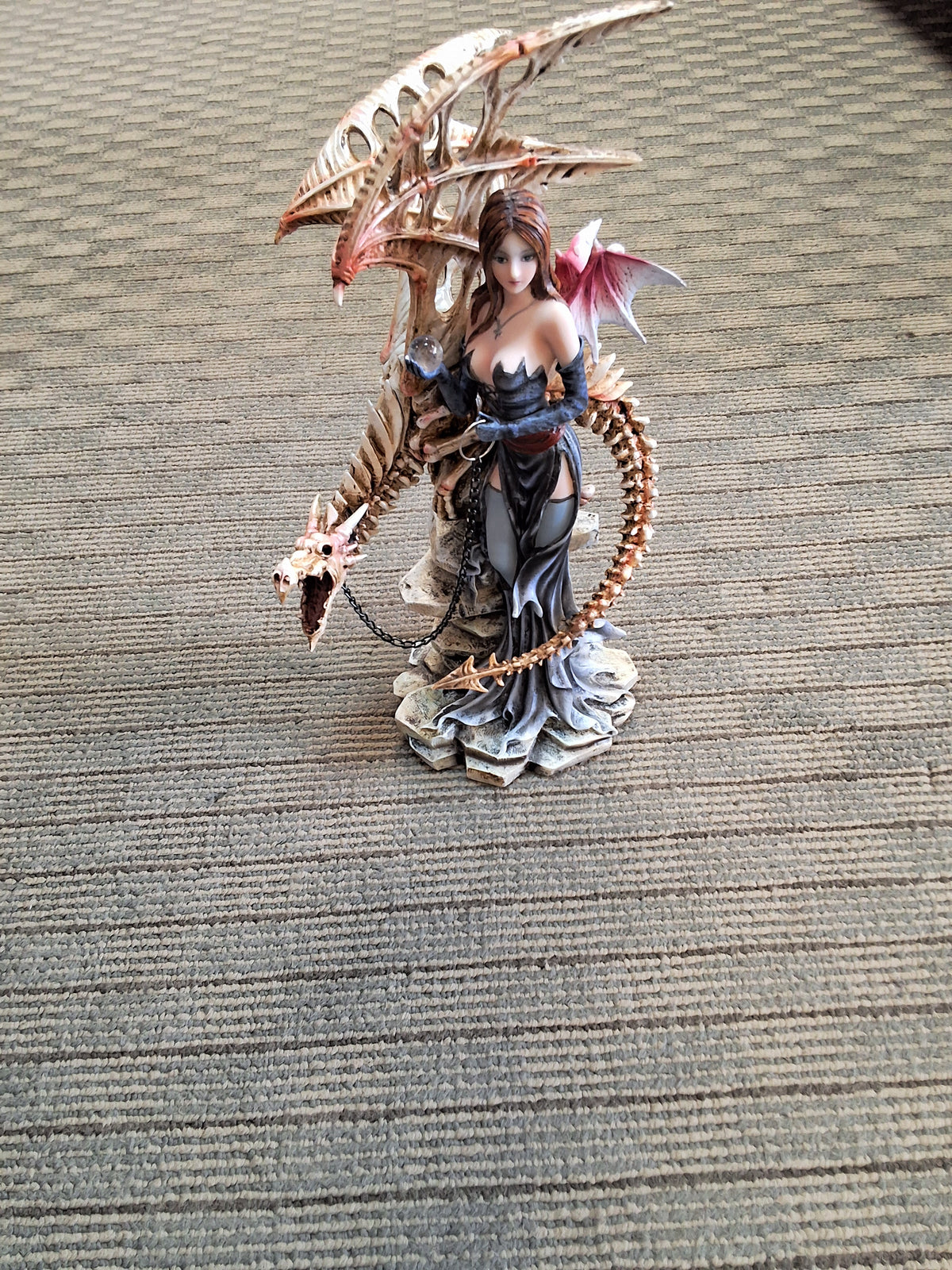 Skeletal dragon fairy statue