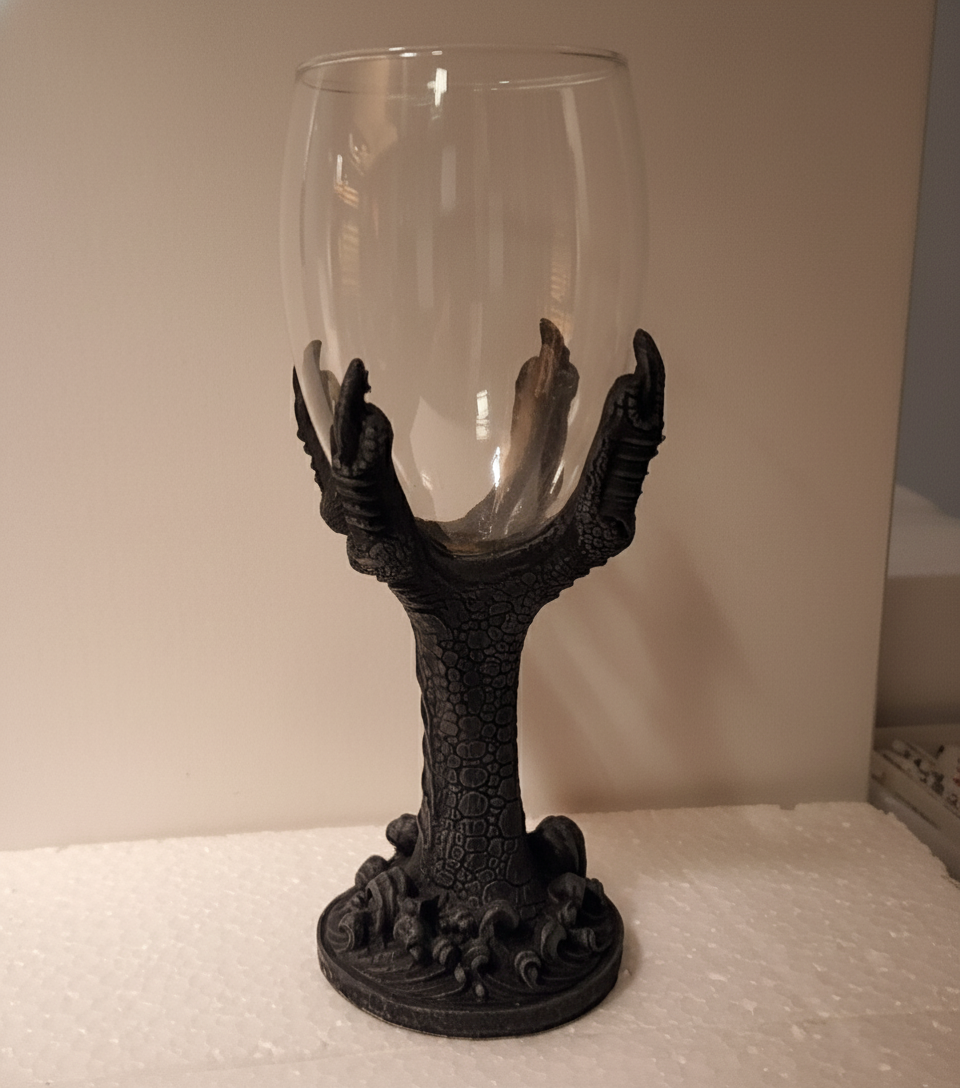DRAGON Claw holding glass