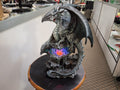 Gray dragon Over a LED Powered Geode