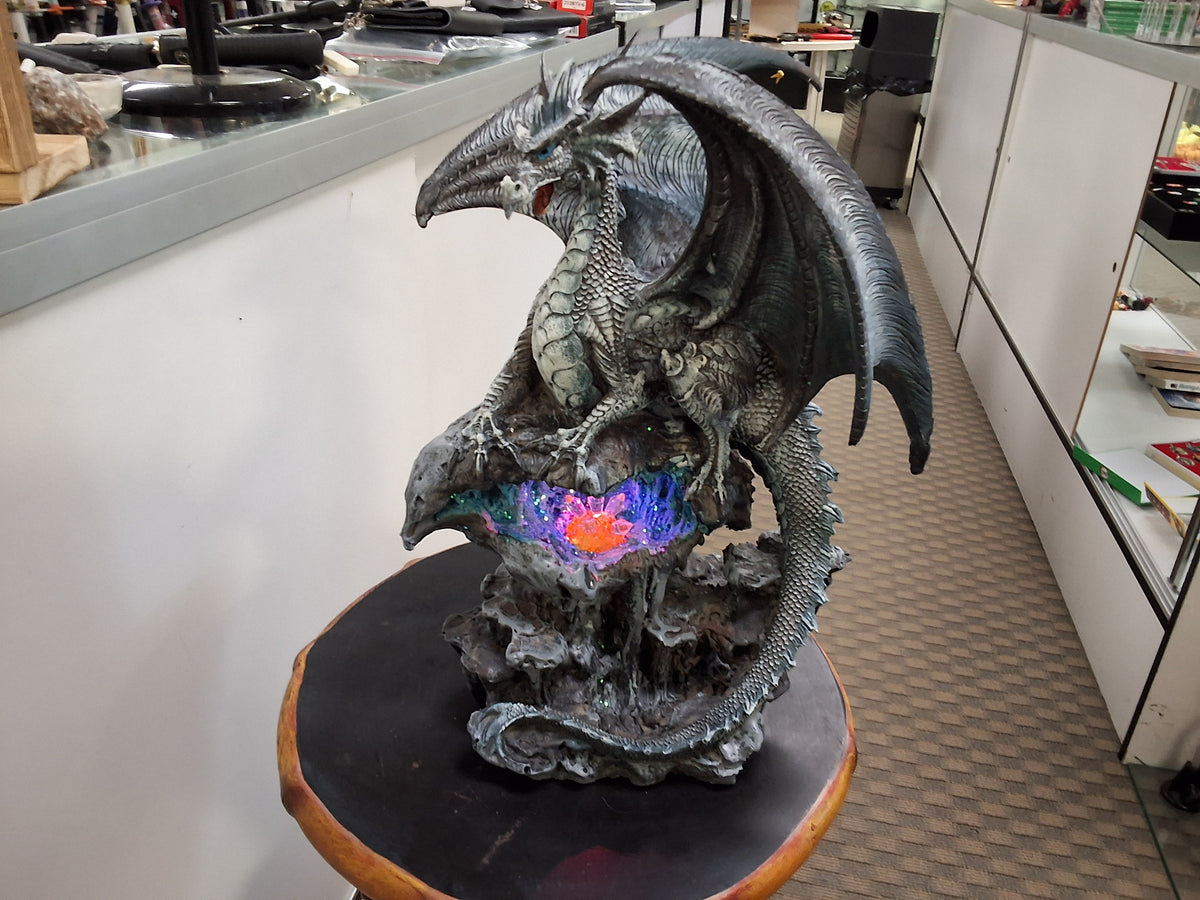 Gray dragon Over a LED Powered Geode