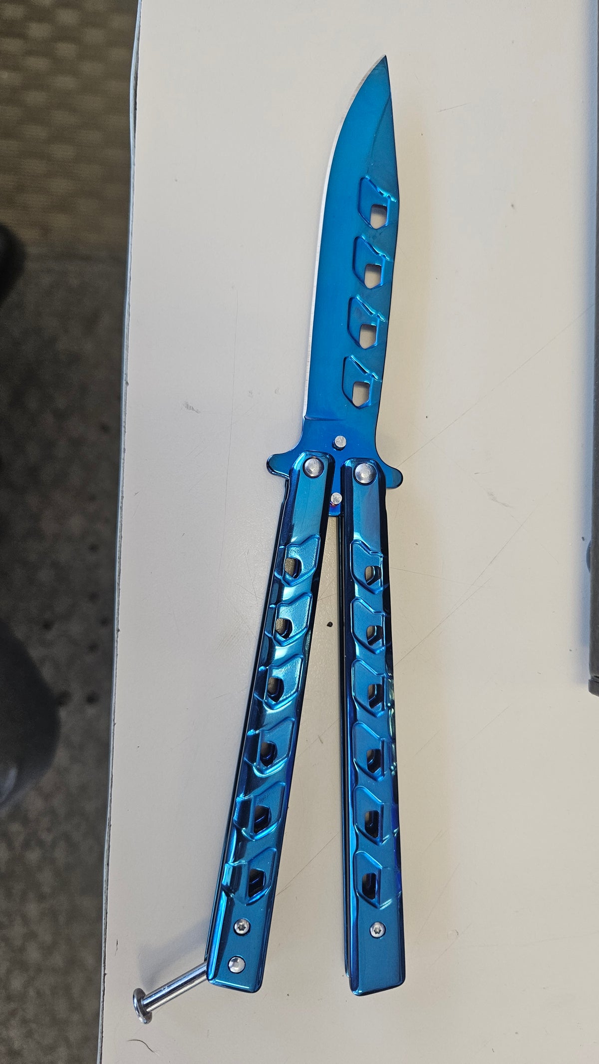 Blue metallic butterfly knife diagonal hole design #1242