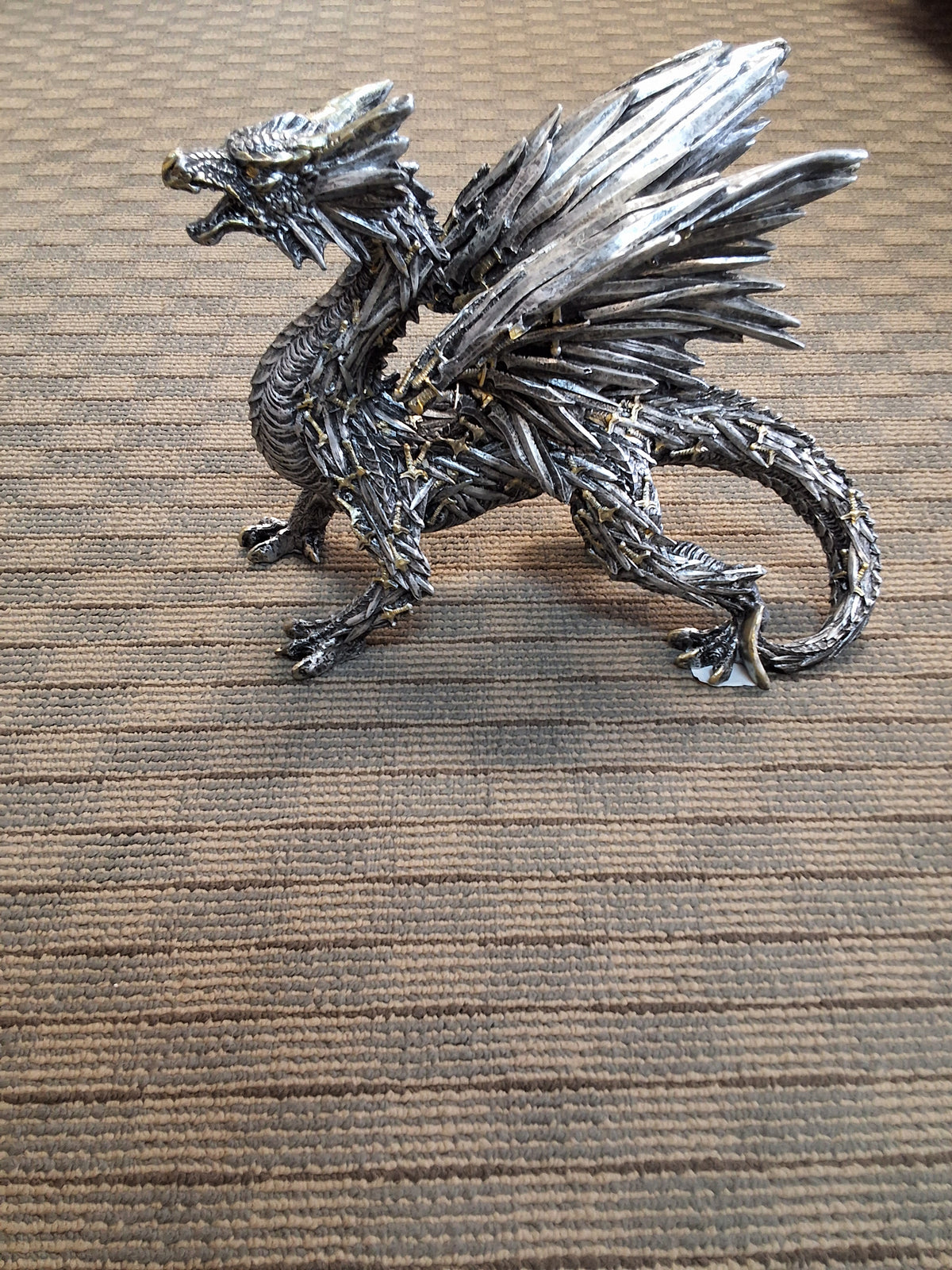 DRAGON MADE OF SWORDS STATUE