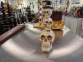 Three stack skulls with top hat