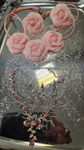 Pink floral necklaces ($19.99 multi styles) Non chain/pendant style