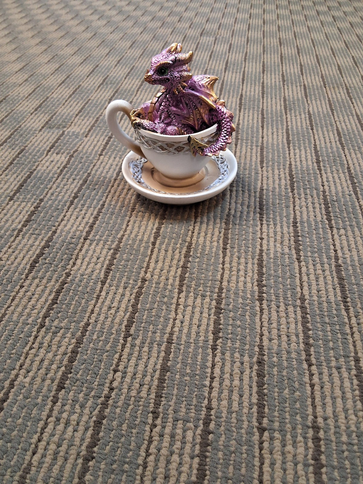 Pink dragon teacup statue