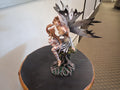 Fairy With Dragon On The Lap
