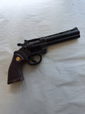 BLACK AND GOLD  FOAM REVOLVER