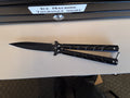Black spear shaped butterfly knife