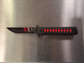 Black folder, red diamonds, from bleach WITH FACE IN BLADE