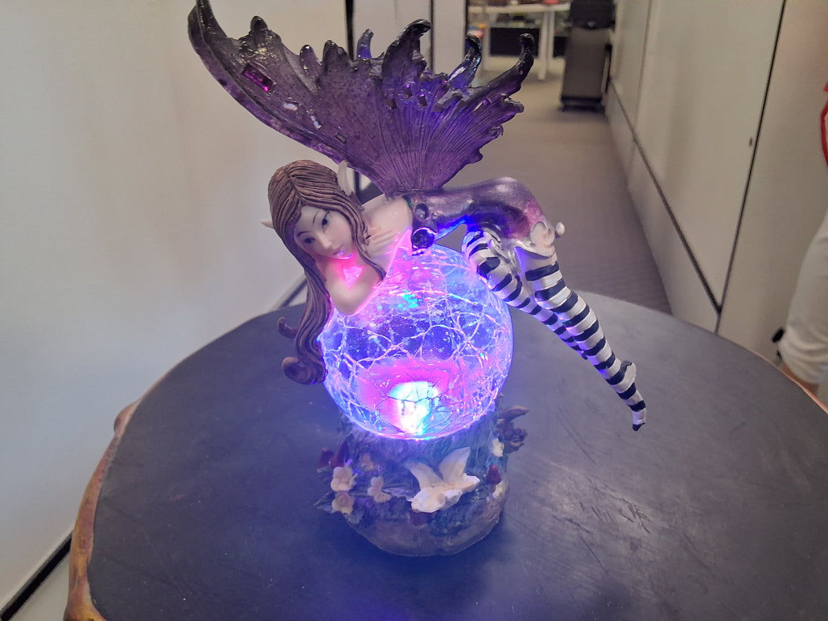 Purple fairy with light up orb